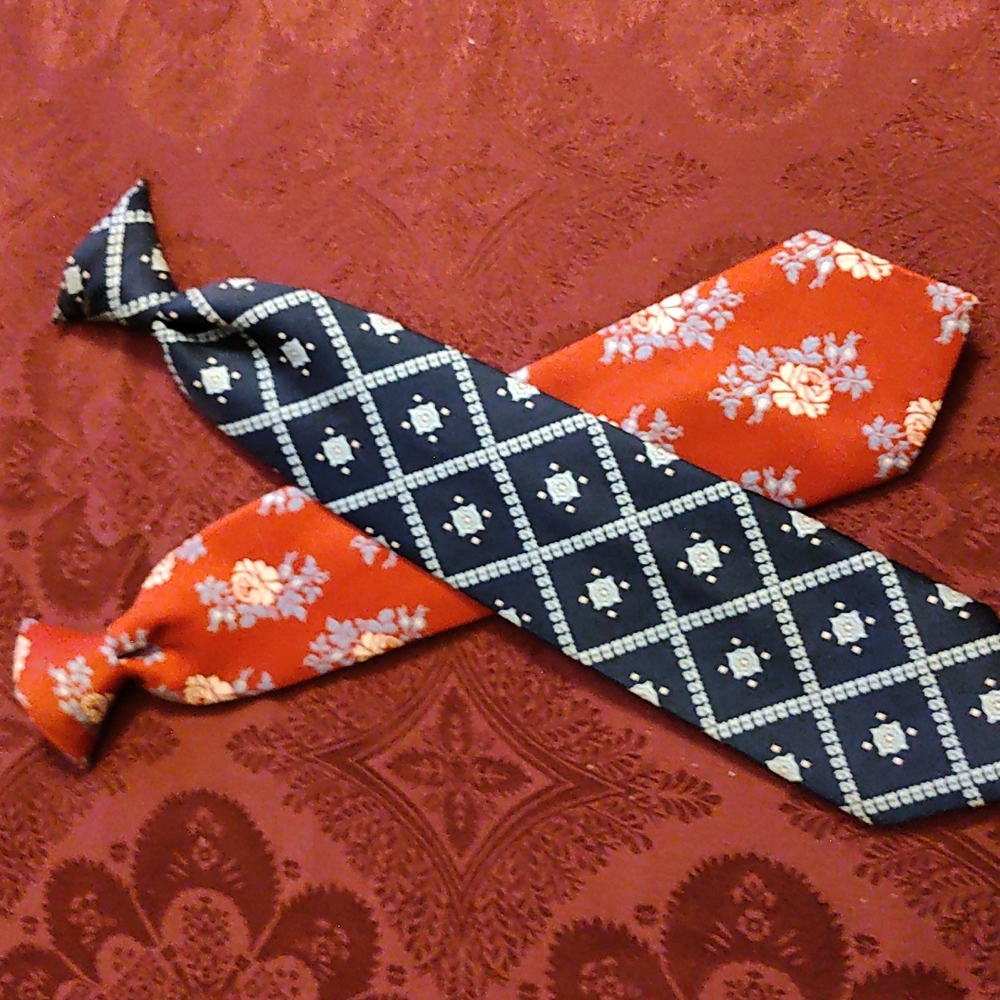Vintage snap ties, man's world and men's store. Lot of 2. 1 blue, 1 burgundy.